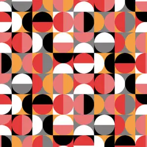 Coral, orange, white, black, and gray circle design fabric